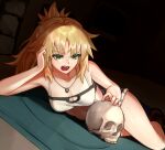  1girl bandeau bare_shoulders blonde_hair blue_shorts braid breasts cleavage collarbone commentary english_commentary fate/apocrypha fate_(series) french_braid green_eyes head_rest highres indoors jewelry lying medium_breasts mordred_(fate) mordred_(fate/apocrypha) mordred_(memories_at_trifas)_(fate) necklace open_mouth ponytail short_hair short_shorts shorts skull solo teeth thighs umeo_(pixiv51103813) upper_teeth_only 