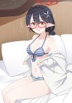  1girl ayane_(blue_archive) bed bikini bikini_under_clothes black_hair blue_archive blush breasts cleavage collarbone commentary_request glasses halo highres hoshino_ouka medium_breasts medium_hair navel pillow pointy_ears shorts solo swimsuit translation_request 