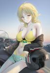  1girl aqua_shorts bangs bare_shoulders black_jacket blonde_hair blush breasts cleavage green_eyes ground_vehicle helmet highres jacket large_breasts long_sleeves medium_hair motor_vehicle motorcycle motorcycle_helmet navel off_shoulder original outdoors parted_lips short_shorts shorts smile solo thighs tokkihouse 