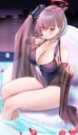  1girl armchair azur_lane bangs bare_shoulders blush breasts building cafenami chair cleavage closed_mouth collarbone duca_degli_abruzzi_(azur_lane) duca_degli_abruzzi_(lustrous_onyx_sirenetta)_(azur_lane) earrings elbow_gloves feet_out_of_frame gloves hair_ornament hairclip halo highres jewelry large_breasts legs lips looking_at_viewer medium_hair night night_sky official_alternate_costume on_water petals pink_hair pool purple_gloves purple_swimsuit red_eyes single_glove sitting sky smile solo swimsuit thighs 