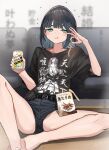  1girl absurdres bangs beer_can belt black_hair black_shirt black_shorts blunt_bangs blurry buta5813 can commentary_request couch drunk earrings eating eyebrows_hidden_by_hair flat_chest food_in_mouth green_eyes highres jewelry medium_hair original shirt short_shorts shorts solo strong_zero t-shirt translation_request 