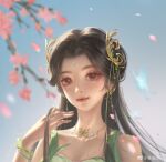  1girl absurdres baiguio_(zhu_xian) bracelet branch brown_hair bug butterfly dress facial_mark falling_petals forehead_mark green_dress hair_ornament hand_in_own_hair highres jewelry long_hair necklace petals second-party_source smile solo upper_body you_yu zhu_xian 