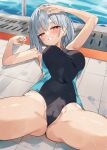  1girl bangs blurry blurry_background blush cameltoe competition_swimsuit covered_navel feet_out_of_frame grey_hair grin groin half-closed_eyes highres indoors looking_at_viewer lying medium_hair on_back one-piece_swimsuit original pool red_eyes short_hair smile solo spread_legs swimsuit unacchi_(nyusankin) water wet 