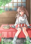  1girl brown_eyes commentary_request cup hakama hakama_shorts high_ponytail highres japanese_clothes kantai_collection long_hair red_shorts shorts sitting smile socks solo sosorin tabi tray white_socks window yunomi zuihou_(kancolle) 