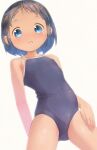  1girl bare_arms bare_shoulders black_hair blue_eyes blue_swimsuit blush brown_background collarbone commentary_request covered_navel forehead hair_ornament hairclip looking_at_viewer one-piece_swimsuit open_mouth original pu-en school_swimsuit short_hair simple_background solo swimsuit tan 