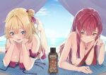  2girls absurdres akai_haato bangs bare_arms bare_shoulders barefoot beach beach_mat bikini blonde_hair blue_eyes blue_sky blush breasts chromatic_aberration closed_mouth commentary_request day eyes_visible_through_hair hair_between_eyes hair_bun hands_on_own_cheeks hands_on_own_face head_rest heart heart_necklace highres hololive houshou_marine jewelry koubou_(cowbow_kun) large_breasts long_hair looking_at_viewer lotion_bottle lying multiple_girls necklace on_stomach open_mouth outdoors red_bikini red_eyes red_hair single_hair_bun sky smile string_bikini swimsuit tent the_pose untied untied_bikini virtual_youtuber yellow_eyes 