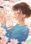  1girl bangs blue_shirt blurry blurry_background brown_eyes brown_hair cherry_blossoms earrings flower glasses hands_up highres jewelry long_sleeves nail_polish original outdoors parted_lips pink_flower round_eyewear saitou_(lynx-shrike) shirt short_hair smile solo tree 