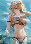  1girl arm_strap bangs bare_shoulders bikini blonde_hair breasts bubble closed_mouth flower genshin_impact hair_flower hair_ornament hand_up highres in_water large_breasts looking_at_viewer lumine_(genshin_impact) medium_hair myoushun navel outdoors partially_submerged sky smile solo swimsuit underboob water wet white_bikini yellow_eyes 