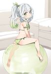 1girl absurdres ass ball bangs bare_shoulders barefoot bikini blurry blurry_background bow cross-shaped_pupils dorontabi elf exercise_ball female_child flat_chest genshin_impact gradient_hair green_bikini green_bow green_eyes green_ribbon grey_hair hair_between_eyes hair_ornament hairband highres leaf_hair_ornament long_hair micro_bikini multicolored_hair nahida_(genshin_impact) pointy_ears ponytail ribbon sitting sitting_on_ball solo swimsuit twintails 