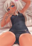  1girl absurdres ass_visible_through_thighs bed bed_sheet black_swimsuit blue_eyes blue_swimsuit breasts cameltoe covered_navel flower hair_flower hair_ornament highres kantai_collection long_hair looking_at_viewer lying makura_(y_makura) name_tag old_school_swimsuit on_back on_bed one-piece_swimsuit one-piece_tan open_mouth pillow ro-500_(kancolle) school_swimsuit small_breasts solo swimsuit swimsuit_under_clothes tan tanlines 