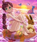  1girl absurdres afloat ahoge ass bangs bare_legs barefoot bracelet braid braided_ponytail brown_hair character_print chloe_(pokemon) closed_mouth collarbone commentary_request crossed_ankles eevee eiscue eiscue_(ice) eyelashes flower frills frown full_body green_eyes hair_flower hair_ornament highres innertube jewelry knees lapras long_hair looking_to_the_side mantyke outdoors own_hands_together pink_flower pokemoa pokemon pokemon_(anime) pokemon_(creature) pokemon_journeys sitting sky sunset swimsuit tentacool toes twilight water 