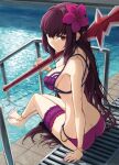  1girl bare_shoulders bikini breasts cleavage fate/grand_order fate_(series) hair_ornament highres holding jewelry kamo_ashi large_breasts long_hair looking_at_viewer official_alternate_costume pool purple_hair red_eyes scathach_(fate) scathach_(swimsuit_assassin)_(fate) smile solo swimsuit weapon 