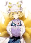  1girl animal_ears blonde_hair blush closed_mouth dress fox_ears fox_tail hair_between_eyes hands_in_opposite_sleeves hat highres jill_07km looking_at_viewer multiple_tails pillow_hat short_hair signature simple_background sleeves_past_fingers sleeves_past_wrists smile solo tabard tail touhou white_background white_dress white_headwear yakumo_ran yellow_eyes 