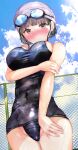  1girl absurdres arm_at_side arms_under_breasts bangs black_hair blue_sky blunt_bangs blush breasts brown_eyes chain-link_fence closed_mouth cloud commentary_request covered_navel day fence goggles goggles_on_head highres large_breasts looking_at_viewer ogata_tei old_school_swimsuit original outdoors school_swimsuit sky solo standing swim_cap swimsuit wet 