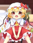  1girl ascot bed bed_sheet bedroom between_legs blonde_hair blurry blurry_background blush collared_shirt crystal depth_of_field fangs feet_out_of_frame flandre_scarlet frilled_shirt_collar frilled_skirt frills hand_between_legs hat hat_ribbon highres indoors koruk700 looking_at_viewer medium_hair mob_cap multicolored_wings on_stool open_mouth pillow pointy_ears red_eyes red_ribbon red_skirt red_vest ribbon shirt sitting skirt skirt_set solo sparkle stool touhou vest white_headwear white_shirt wings yellow_ascot 