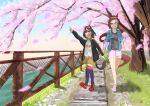  2girls absurdres ahoge animal_ears arm_up black_hair black_jacket blue_jacket blurry blurry_foreground brown_hair brown_shorts carrot_print casual cherry_blossoms child collarbone commentary_request ear_ornament falling_petals fence flower_in_eye food_print gold_hairband harayama_(mambition) highres holding_hands horse_ears horse_girl horse_tail jacket kitasan_black_(umamusume) long_hair long_sleeves multicolored_hair multiple_girls object_namesake official_alternate_costume petals pink_eyes pink_footwear pink_shorts pointing print_shirt purple_thighhighs red_eyes red_footwear river sakura_bakushin_o_(umamusume) shirt shorts sidelocks streaked_hair symbol_in_eye t-shirt tail thighhighs track_jacket tree two-tone_hair umamusume very_long_hair walking white_hair 