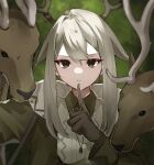  1girl animal antlers arknights collared_shirt deer_antlers deer_girl finger_to_mouth firewatch_(arknights) gloves goma_74umai green_jacket grey_hair hair_between_eyes highres hood hoodie horns jacket jewelry long_hair looking_at_viewer mole mole_under_eye necklace open_clothes open_hoodie reindeer reindeer_antlers reindeer_girl shirt sidelocks 