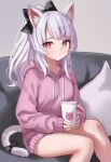  1girl absurdres animal_ear_fluff animal_ears bare_legs black_bow bow cat_ears cat_girl cat_tail closed_mouth couch cup expressionless eyelashes fanteam feet_out_of_frame hair_bow highres holding holding_cup hood hood_down hooded_sweater hoodie long_hair long_sleeves looking_at_viewer on_couch original pillow pink_eyes pink_hoodie pink_sweater ponytail sitting sleeves_past_wrists solo sweater tail tail_bow tail_ornament white_hair 