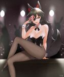  1girl animal_ear_fluff animal_ears bangs black_bow black_bowtie black_hair black_leotard bow bowtie breasts card cleavage commentary_request covering_one_eye fang foot_out_of_frame grey_pantyhose hair_between_eyes highres holding holding_card imaizumi_kagerou ke-su large_breasts legs leotard long_hair looking_at_viewer open_mouth pantyhose playing_card red_eyes sitting smile solo spotlight strapless strapless_leotard tail touhou wolf_ears wolf_girl wolf_tail wrist_cuffs 