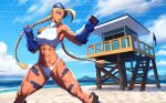  1girl abs ahoge antenna_hair beach beret blonde_hair bodypaint braid breasts cammy_white capcom fighting_stance fingerless_gloves gloves hat highres medium_breasts muscular muscular_female ogami scar solo sports_bikini street_fighter tan thighs twin_braids 