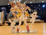  1girl :3 animal_collar animal_ears bone_hair_ornament braid breasts brown_eyes brown_hair cleavage collar colored_pencil_(medium) croissant dog dog_ears dog_girl dog_tail dress food futo-inu hair_ornament hand_on_hip highres hololive hoso-inu inugami_korone jacket jqhnharqld low_twin_braids medium_breasts off_shoulder open_clothes open_jacket photo_(medium) pointing severed_finger smile solo tail traditional_media twin_braids virtual_youtuber white_dress wristband yellow_jacket yubi_yubi_(inugami_korone) 