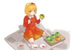  1girl aki_shizuha barefoot blonde_hair blush buttons closed_mouth food fruit hair_ornament holding holding_food holding_fruit holding_paintbrush itatatata leaf_hair_ornament long_sleeves newspaper paintbrush persimmon red_shirt red_skirt shirt short_hair simple_background skirt smile solo touhou white_background yellow_eyes 