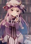  1girl blue_bow blurry blurry_background bookshelf bow capelet closed_mouth crescent crescent_hat_ornament dress hair_bow hat hat_ornament highres indoors library long_hair long_sleeves looking_at_viewer mob_cap natsume_suzuri patchouli_knowledge purple_capelet purple_dress purple_eyes purple_hair purple_headwear red_bow sidelocks smile solo striped striped_dress touhou twitter_username 