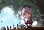  1girl ascot black_headwear blurry blurry_background board_game chess cup day grey_hair hat highres holding holding_cup long_sleeves outdoors puffy_long_sleeves puffy_sleeves purple_eyes sakayanagi_arisu solo tea teacup teapot tiered_tray ylpz_23 youkoso_jitsuryoku_shijou_shugi_no_kyoushitsu_e 