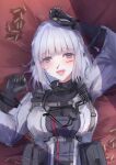  1girl absurdres bangs blood blood_on_face blush breasts commentary_request girls&#039;_frontline gloves grey_hair highres injury long_hair looking_at_viewer lying martinreaction on_back open_mouth purple_eyes rpk-16_(girls&#039;_frontline) shell_casing short_hair smile solo tactical_clothes teeth upper_teeth 