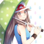  1girl blush brown_eyes brown_hair closed_mouth commentary_request eyelashes from_side green_umbrella hair_flaps hands_up hat holding holding_umbrella leaf_(pokemon) long_hair looking_at_viewer pokemon pokemon_(game) pokemon_frlg polka_dot polka_dot_umbrella scbstella smile solo umbrella upper_body white_background white_headwear wristband 