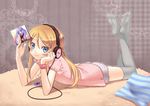  bed blue_eyes digital_media_player feet hands headphones highres kousaka_kirino legs long_hair lying nana_mikoto on_stomach orange_hair ore_no_imouto_ga_konna_ni_kawaii_wake_ga_nai smile solo thighhighs 