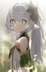  1girl bangs bare_shoulders blurry blurry_background blush closed_mouth commentary cross-shaped_pupils darkzmonsty depth_of_field dress english_commentary from_side genshin_impact green_eyes grey_hair hair_between_eyes hair_ornament highres long_hair looking_at_viewer looking_to_the_side nahida_(genshin_impact) pointy_ears ponytail sleeveless sleeveless_dress solo upper_body very_long_hair white_dress 