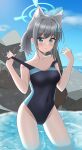 1girl animal_ear_fluff animal_ears bangs black_one-piece_swimsuit blue_archive blue_eyes blue_sky breasts clothes_pull cloud cobalt_(cobalt426) competition_swimsuit contrapposto covered_navel cowboy_shot cross_hair_ornament day error extra_digits extra_ears grey_hair hair_ornament halo highres horizon low_ponytail medium_breasts medium_hair mismatched_pupils multicolored_clothes multicolored_swimsuit ocean one-piece_swimsuit outdoors rock shiroko_(blue_archive) shiroko_(swimsuit)_(blue_archive) sky soaking_feet solo standing swimsuit swimsuit_pull 
