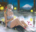  1girl absurdres arowana2111 bangs barefoot blue_eyes blunt_bangs bow braid braided_ponytail breasts bucket cleavage closed_mouth commentary dated_commentary english_commentary full_body hair_bow highres large_breasts leg_ribbon long_hair looking_at_viewer mole mole_under_eye mountainous_horizon naked_towel night onsen original petals pink_bow pink_ribbon ribbon sidelocks sitting solo tokkuri towel water white_hair wooden_bucket 