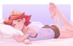  1girl ahoge amanda_o&#039;neill barefoot brown_shorts camisole closed_mouth dnaitari feet feet_up green_eyes highres legs little_witch_academia looking_at_viewer lying multicolored_hair object_hug on_stomach orange_hair pillow pillow_hug red_hair short_hair shorts soles solo toes two-tone_hair 