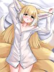  1girl absurdres animal_ear_fluff animal_ears arknights arms_up bangs bed_sheet blonde_hair blush brown_eyes collarbone collared_shirt commentary dress_shirt english_commentary fox_ears fox_girl fox_tail hair_between_eyes highres kyuubi long_hair looking_at_viewer lying multicolored_hair multiple_tails naked_shirt nose_blush on_back parted_lips pillow rylaera shirt solo suzuran_(arknights) tail two-tone_hair white_hair white_shirt 