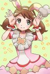  1girl animal_ears bangs brown_hair bunny_pose choker dress fake_animal_ears floral_background green_eyes highres may_(pokemon) official_alternate_costume pink_choker pink_dress pokemon pokemon_(game) pokemon_masters_ex rabbit_ears shugara smile solo wrist_cuffs yellow_background 