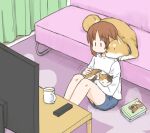  1girl alternate_costume animal blue_shorts boko_(girls_und_panzer) book calico cat coffee_mug commentary controller couch cup dog girls_und_panzer holding holding_animal indoors loungewear motion_lines mug mutsu_(layergreen) nishizumi_miho no_mouth petting remote_control shiba_inu shirt shorts steam t-shirt television white_shirt 