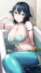  1girl awono_nanaumi bath bathing bathroom bathtub blue_hair breasts cleavage collarbone commentary english_commentary fukami_nana green_eyes hair_flaps highres indoors large_breasts looking_at_viewer mermaid monster_girl original partially_submerged shadow solo tile_wall tiles water 
