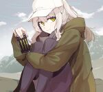  1girl blue_archive blush can drink drink_can energy_drink eri_(erikiri) green_eyes green_jacket grey_hair halo hare_(blue_archive) hare_(camp)_(blue_archive) hat highres holding holding_can holding_drink jacket long_hair long_sleeves monster_energy official_alternate_costume ponytail scarf white_headwear 