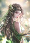  1girl absurdres baiguio_(zhu_xian) bare_shoulders blue_eyes blurry blurry_background brown_hair closed_mouth dress earrings facial_mark forehead_mark green_dress hair_ornament highres jewelry long_hair looking_back nini_zaizai second-party_source solo upper_body zhu_xian 