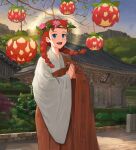  1girl :d anne_of_green_gables anne_shirley architecture blue_eyes braid day east_asian_architecture flower freckles hair_flower hair_ornament highres japanese_clothes kimono outdoors own_hands_together present_art red_hair shrine smile solo standing twin_braids twintails wide_sleeves 