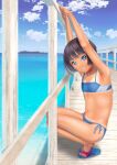  1girl armpits arms_up bikini black_hair blue_bikini blue_eyes blue_sky cloud commentary_request day flat_chest highres horizon looking_at_viewer navel ocean original outdoors pier railing sandals short_hair side-tie_bikini_bottom sky smile solo squatting swimsuit tan tanlines thighs uzuki_mei water 