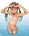  1girl bikini black_hair brown_eyes caustics commentary_request flat_chest floral_print halterneck highres long_hair looking_at_viewer navel original print_bikini shading_eyes side-tie_bikini_bottom smile solo standing swimsuit tan tanlines twintails uzuki_mei wading water 