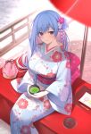  1girl absurdres blue_eyes blue_flower blue_hair blue_kimono blush breasts closed_mouth coin_purse commentary cup day emori_miku emori_miku_project feet_out_of_frame floral_print flower from_above green_tea hair_bun hair_flower hair_ornament highres holding holding_cup japanese_clothes kagachi_saku kimono large_breasts long_hair long_sleeves looking_at_viewer miko_(royal_milk) obi outdoors pink_flower pink_sash print_kimono railing sash second-party_source sitting smile solo sunlight symbol-only_commentary tea umbrella very_long_hair white_flower wide_sleeves 