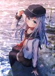  1girl absurdres anchor_symbol black_headwear black_sailor_collar black_skirt black_thighhighs blue_eyes blush closed_mouth collarbone dfd flat_cap hair_between_eyes hat hibiki_(kancolle) highres kantai_collection long_hair long_sleeves looking_at_viewer neckerchief pleated_skirt red_neckerchief sailor_collar school_uniform serafuku sitting skirt smile solo thighhighs white_hair 