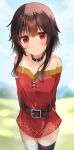  1girl absurdres arms_behind_back bandaged_leg bandages bangs bare_shoulders belt black_choker blurry blurry_background blush brown_belt brown_hair choker collarbone dress highres kono_subarashii_sekai_ni_shukufuku_wo! looking_at_viewer megumin no_headwear red_dress red_eyes shiny_hiar short_dress single_thighhigh smile solo thighhighs yuno_(suke_yuno) 