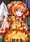 1girl apron bell blush checkered_clothes checkered_kimono clothes_writing green_skirt hair_bell hair_between_eyes hair_ornament highres japanese_clothes jingle_bell kimono long_sleeves motoori_kosuzu open_mouth red_eyes red_hair ruu_(tksymkw) short_hair skirt smile solo touhou two_side_up wide_sleeves yellow_apron 