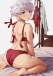  1girl alisaie_leveilleur ass back barefoot bed blue_eyes blurry blurry_background blush bra clothes_removed elezen elf feet final_fantasy final_fantasy_xiv food highres light_blush looking_at_viewer looking_back open_bra panties pocky pocky_in_mouth pointy_ears ponytail red_bra red_panties sitting soles solo toes underwear ver-aero wariza white_hair 