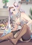  1girl bangs bare_shoulders blue_eyes blush breasts britomart_(fate) brown_pantyhose brown_shorts buttons cleavage contemporary double-breasted double_bun fate/grand_order fate_(series) fireplace grey_hair hair_bun hairband halterneck high-waist_shorts highres indoors large_breasts long_hair looking_at_viewer nakaga_eri pantyhose pointy_ears shorts sideboob sitting solo sweater turtleneck turtleneck_sweater twintails very_long_hair 